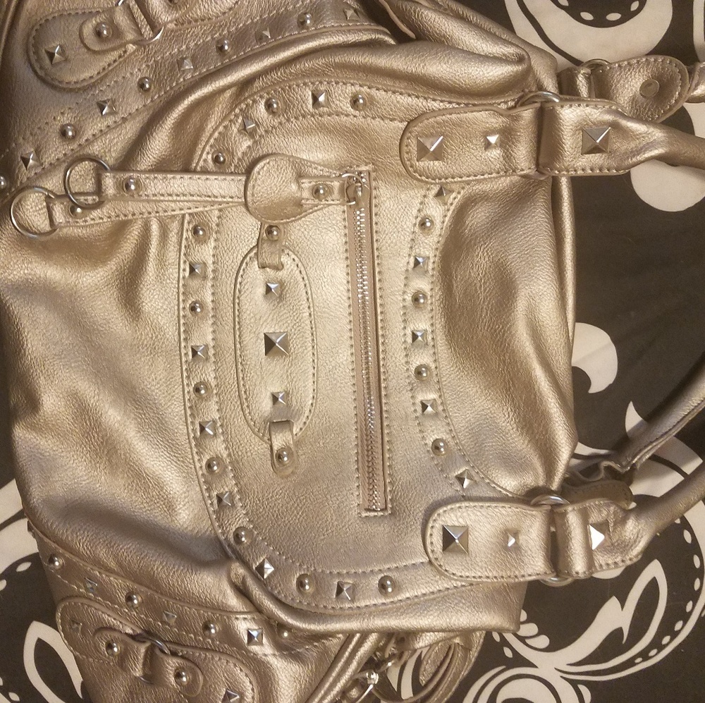 Studded bag with fun cheetah print liner